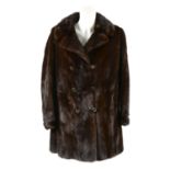 A three-quarter length ranch mink coat.