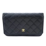 CHANEL - a black leather Wallet On Chain 'WOC' handbag.