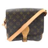 LOUIS VUITTON - a vintage Monogram Cartouchière handbag.