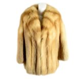 A red fox fur coat.