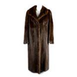 A full-length ranch mink coat.