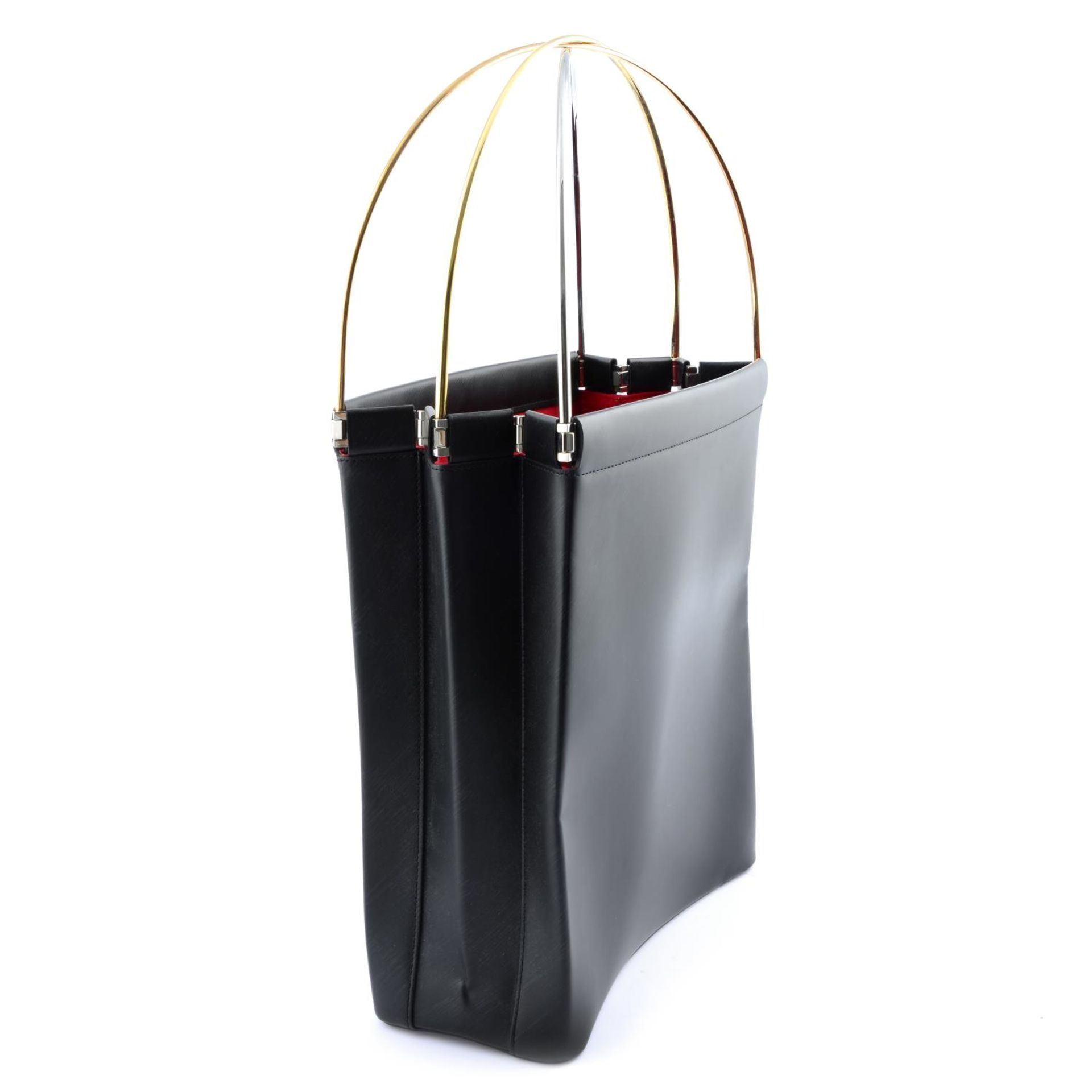 CARTIER - a tall black Trinity handbag. - Bild 4 aus 6