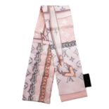 LOUIS VUITTON - a Monogram Confidential bandeau scarf.