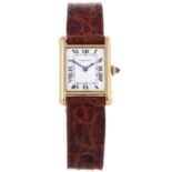 CARTIER - a lady's Tank wrist watch.