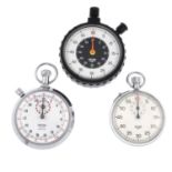 A group of three stopwatch timers to include examples by Heuer and Smiths.