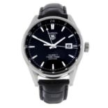 TAG HEUER - a gentleman's Carrera Twin-Time wrist watch.