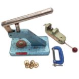 A Seiko branded watch press together with a selection of general tools and horological spare parts.