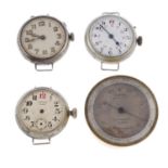 A group of four trench style watch heads,