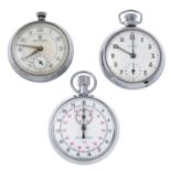 A group of four assorted pocket watches and a stopwatch.