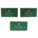 ROLEX - a group of three metal 'Sky-Dweller' watch display signs.