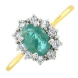An 18ct gold emerald and brilliant-cut diamond cluster ring.Emerald calculated weight 0.57ct,