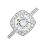 A fracture-filled brilliant-cut diamond cluster ring.Principal diamond estimated weight