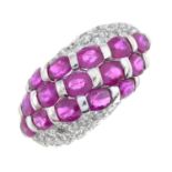 A ruby and brilliant-cut diamond dress ring.Total ruby calculated weight 3cts,