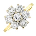 An 18ct gold brilliant-cut diamond floral cluster ring.Estimated total diamond weight 1.10cts,