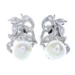 A pair of brilliant-cut diamond and cultured pearl earrings.fittings for non pierced