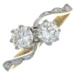 An 18ct gold brilliant-cut diamond crossover ring.Estimated total diamond weight 0.60ct,