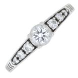 A brilliant-cut diamond dress ring.Estimated total diamond weight 0.50ct,