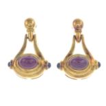 A pair of sapphire and ruby cabochon drop earrings.Stamped 750, Italian marks.