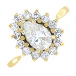 An 18ct gold vari-cut diamond cluster ring.Principal pear-shape diamond estimated weight 0.50ct,