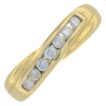 An 18ct gold brilliant-cut diamond crossover ring.Total diamond weight 0.25ct, stamped to band.