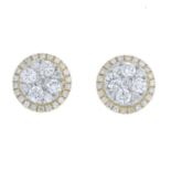 A pair of 18ct gold brilliant-cut diamond cluster earrings.Total diamond weight 0.88ct.Hallmarks