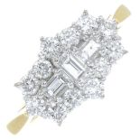 An 18ct gold brilliant and baguette-cut diamond dress ring.Estimated total diamond weight