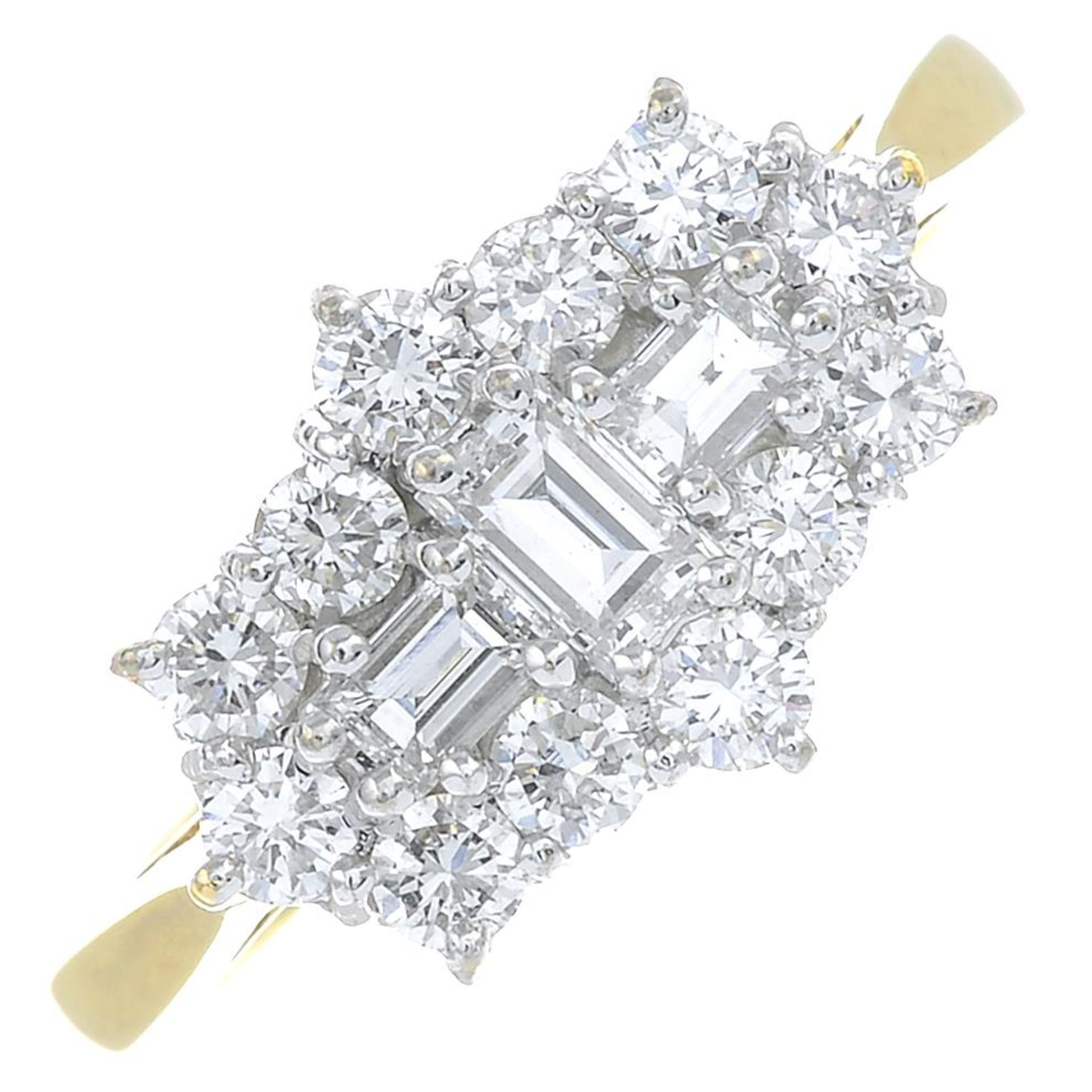 An 18ct gold brilliant and baguette-cut diamond dress ring.Estimated total diamond weight