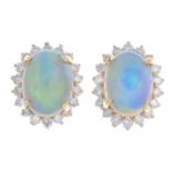 A pair of 18ct gold opal and brilliant-cut diamond cluster earrings.Total opal weight 0.96ct,