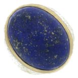 A gentleman's 18ct gold lapis lazuli single-stone ring.Estimated dimensions of lapis lazuli 19.4 by