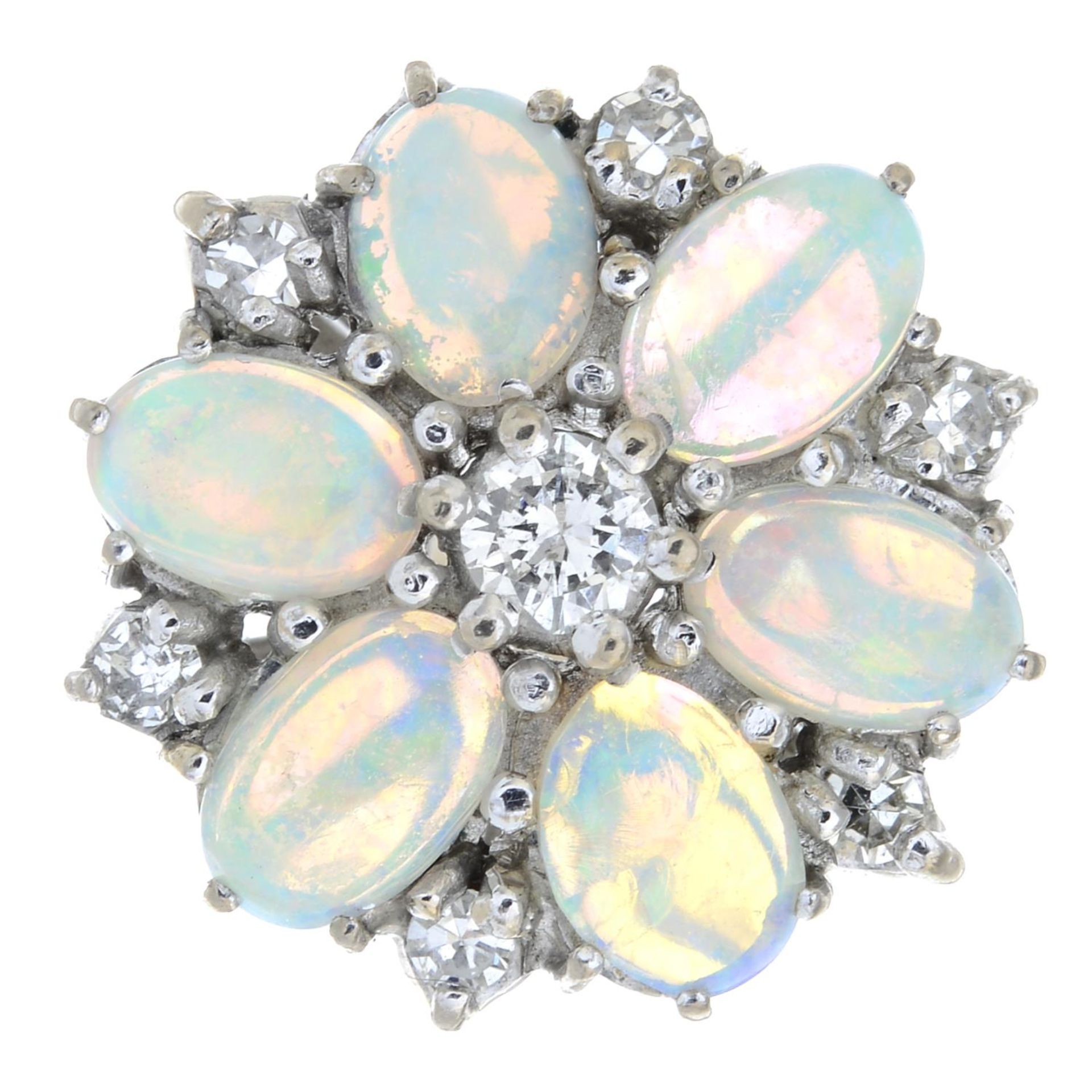 A 1970s 18ct gold opal cabochon and single-cut diamond cluster ring.Hallmarks for Birmingham,