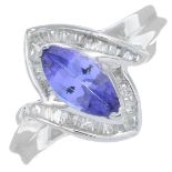 A 15ct gold tanzanite and baguette-cut diamond cluster ring.Tanzanite calculated weight 0.81ct,