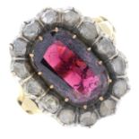 A garnet and rose-cut diamond cluster ring.