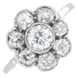 An old-cut diamond floral cluster ring.Estimated total diamond weight 1.35cts,