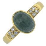 An emerald cabochon and single-cut diamond dress ring.Emerald calculated weight 2.43cts,