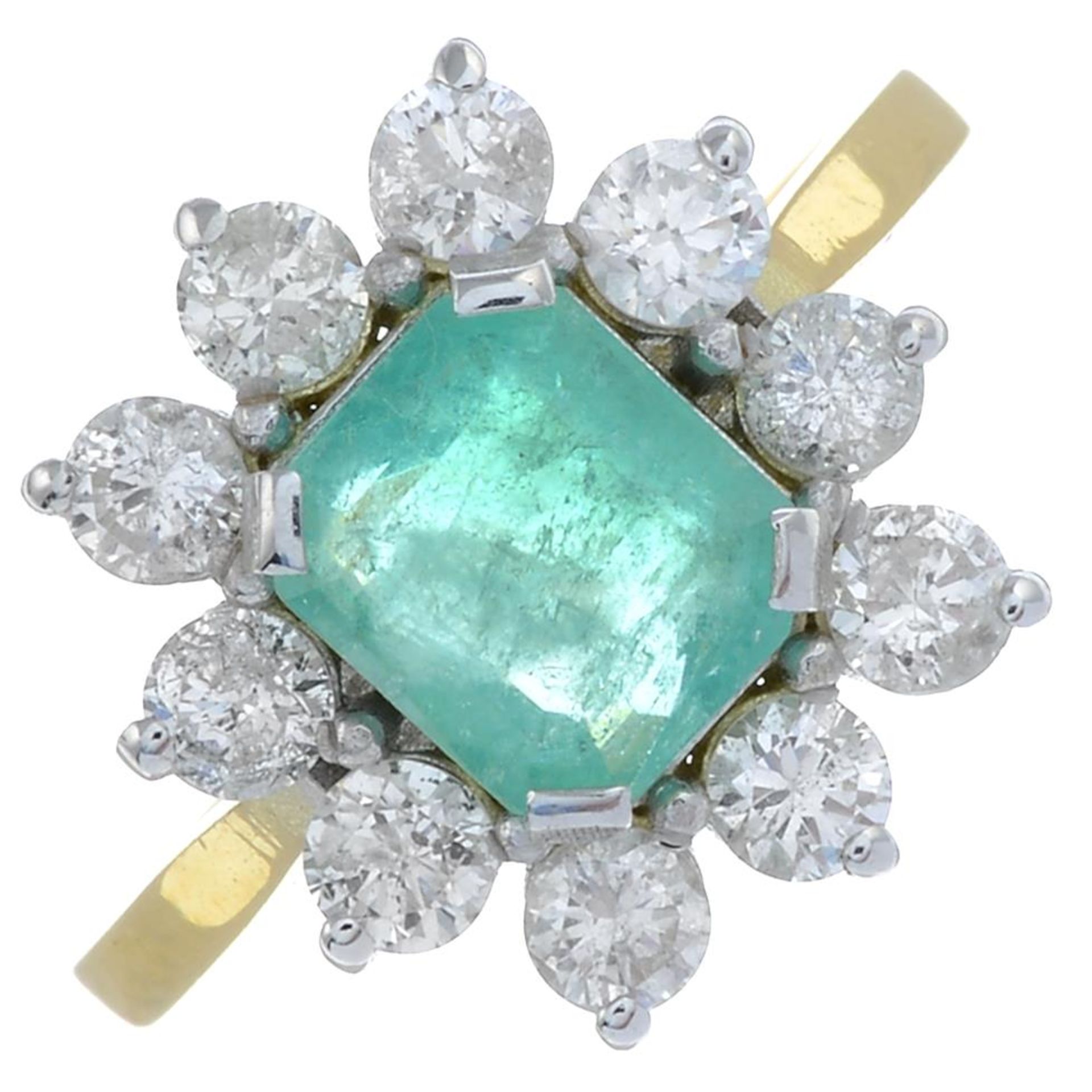 An emerald and brilliant-cut diamond cluster ring.