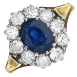 An 18ct gold sapphire and brilliant-cut diamond cluster ring.Sapphire calculated weight 1.16cts,