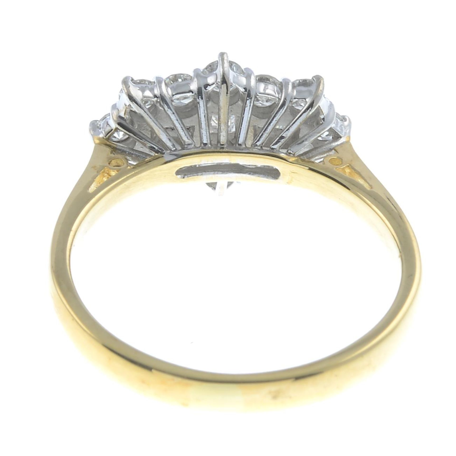 An 18ct gold brilliant and baguette-cut diamond dress ring.Estimated total diamond weight - Image 2 of 3