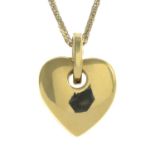 A heart-shape pendant, suspended from a chain.Italian marks.