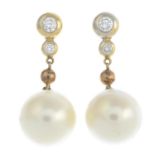A pair of cultured pearl and brilliant-cut diamond earrings.Cultured pearls measuring approximately