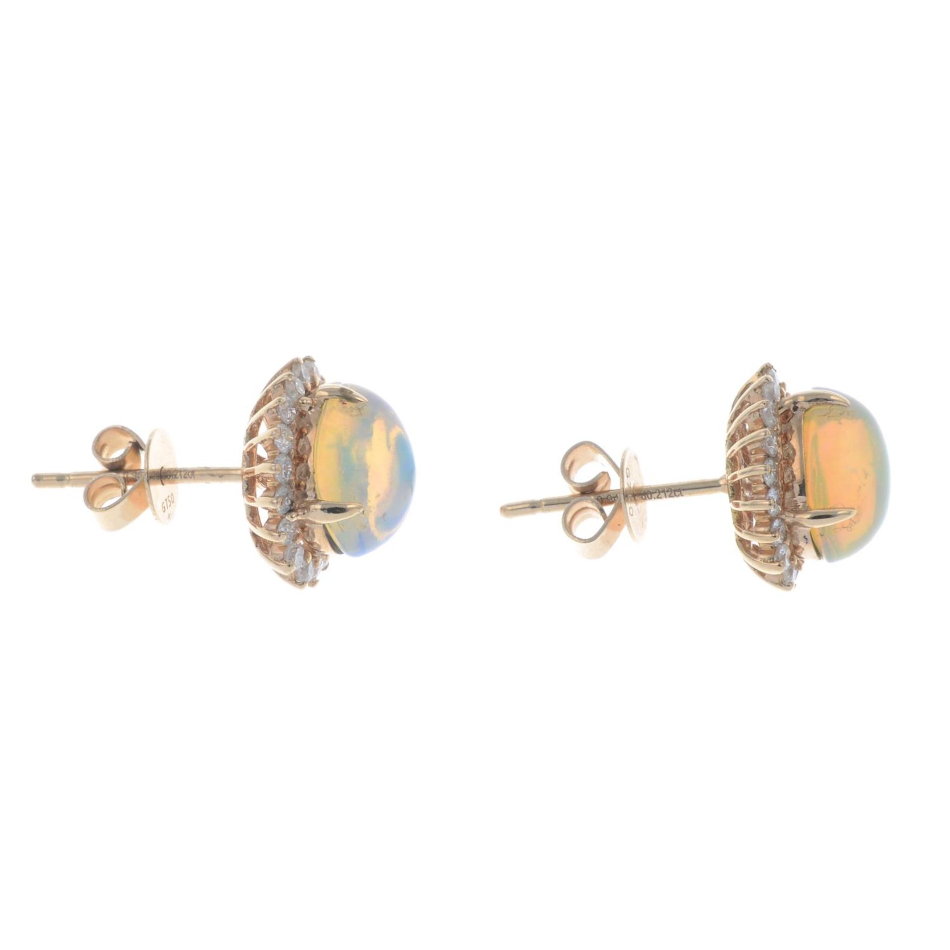 A pair of 18ct gold opal and brilliant-cut diamond cluster earrings.Total opal weight 0.96ct, - Bild 2 aus 2