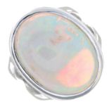 An oval opal cabochon ring.Estimated dimensions of opal 21.2 by 15 by 11.2mms.Ring size P.