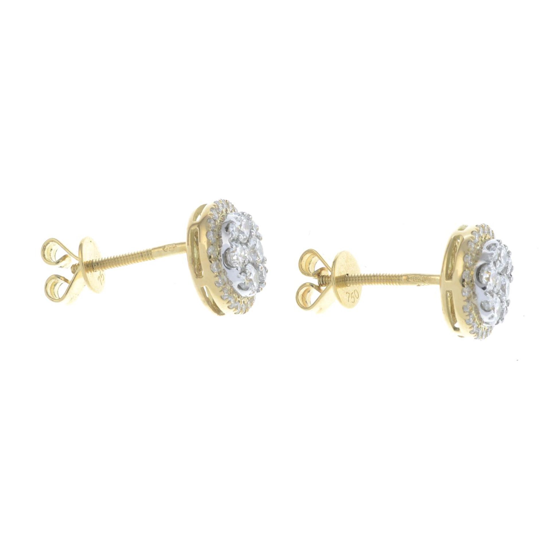 A pair of 18ct gold brilliant-cut diamond cluster earrings.Total diamond weight 0.88ct.Hallmarks - Bild 2 aus 2