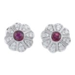 A pair of 18ct gold ruby and brilliant-cut diamond cluster earrings.Estimated total diamond weight