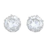 A pair of brilliant-cut diamond single-stone stud earrings.Estimated total diamond weight 1.20cts,
