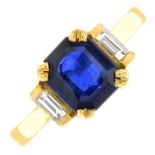 An 18ct gold sapphire and baguette-cut diamond three-stone ring.Sapphire calculated weight 1.83cts,