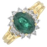 An 18ct gold emerald and brilliant-cut diamond cluster ring.Emerald calculated weight 1.81cts,