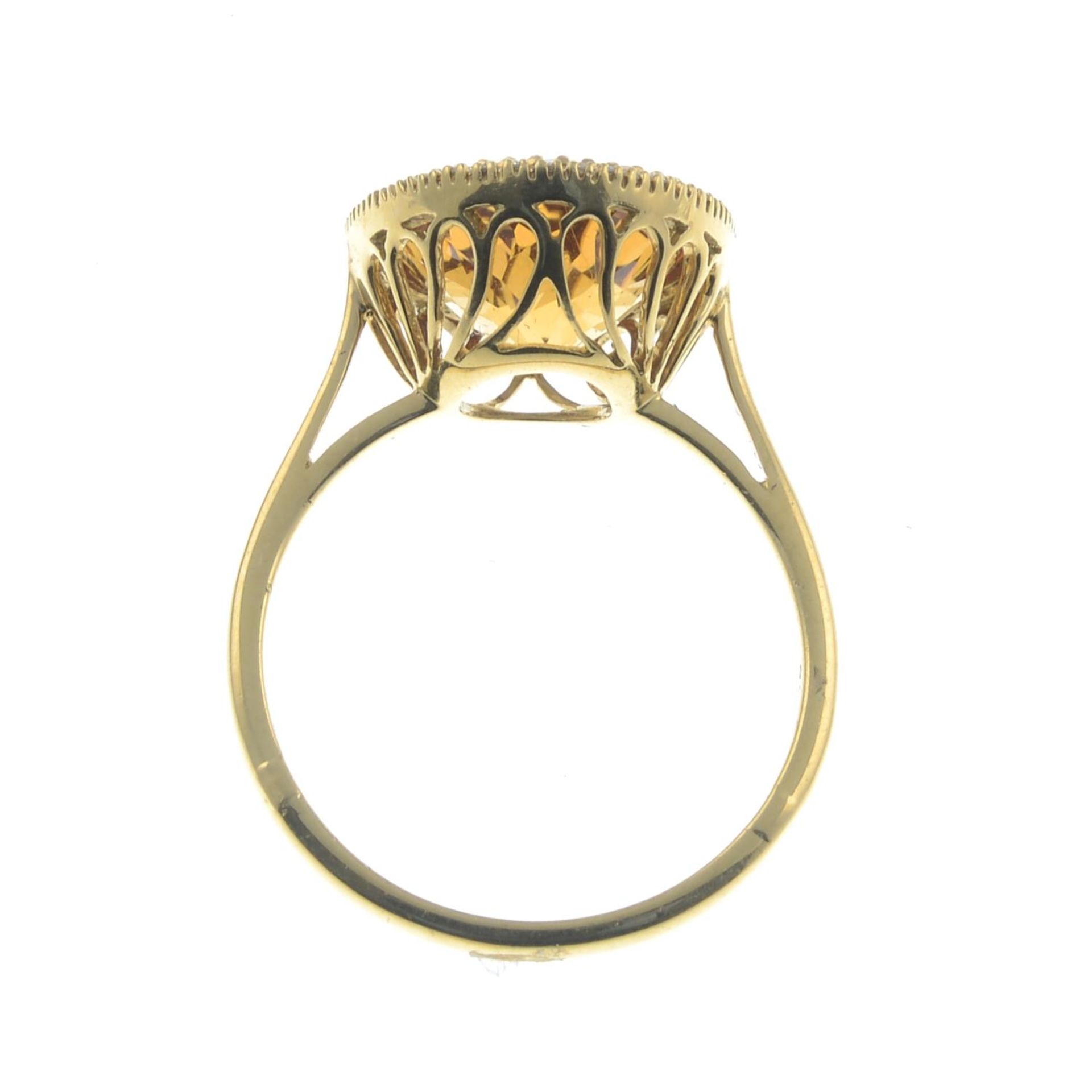 An 18ct gold citrine and brilliant-cut diamond cluster ring.Citrine calculated weight 4.21cts, - Image 3 of 3