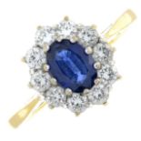 An 18ct gold sapphire and brilliant-cut diamond cluster ring.Sapphire calculated weight 0.82ct,