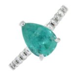 A platinum pear-shape emerald single-stone ring, with brilliant-cut diamond shoulders.