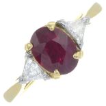 An 18ct gold ruby and triangular-shape diamond three-stone ring.Ruby calculated weight 1.17cts,